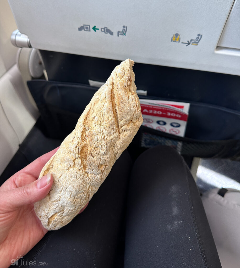 homemade gluten free baguette on airplane as travel food