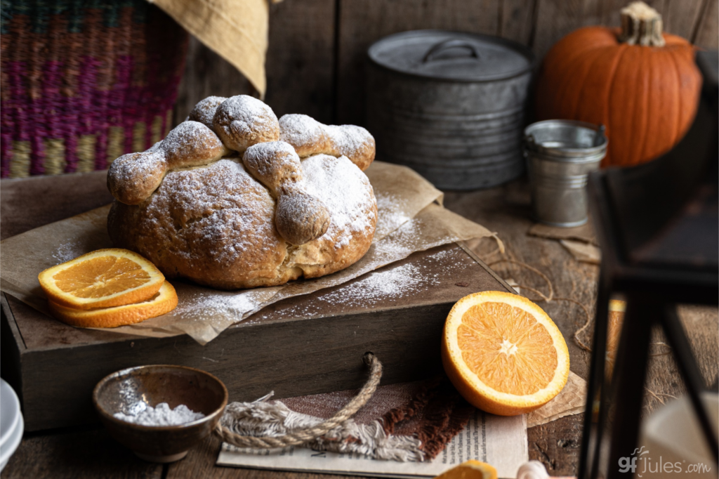 gluten free pan de muerto dusted with powdered sugar